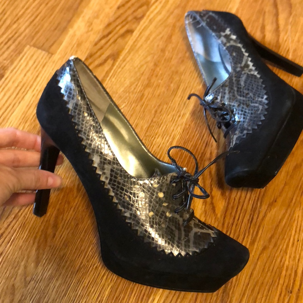 Heeled ankle booties with snake skin